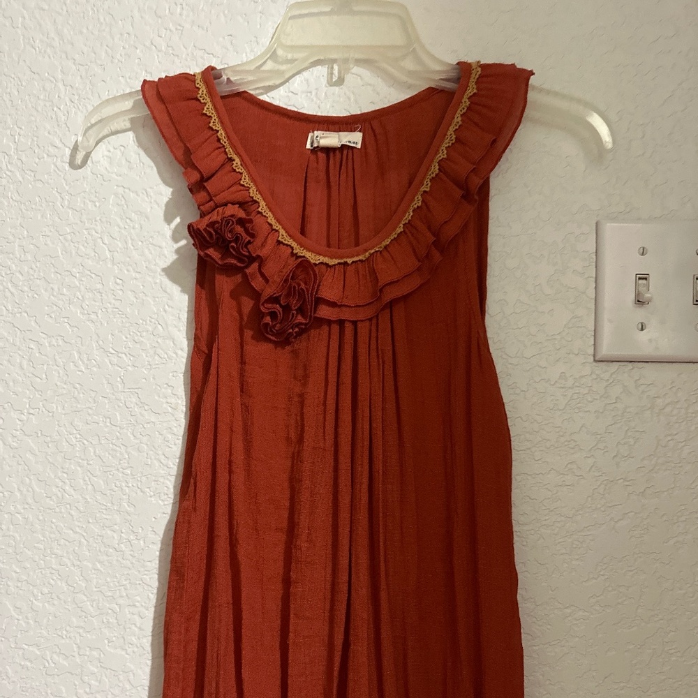 Top with floral decoration